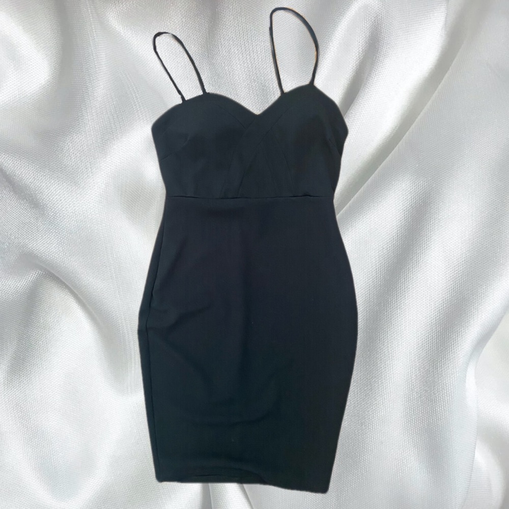 Knee length black pencil dress